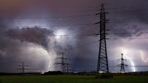 High voltage electrical mast with lightning storm